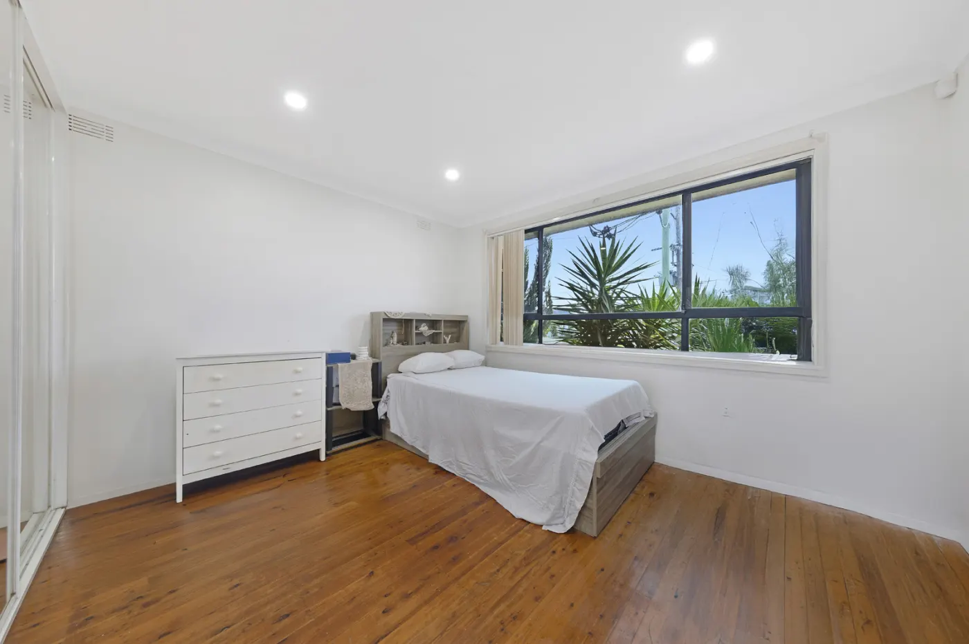 Styled short-stay living room photographed for a Sydney accommodation listing