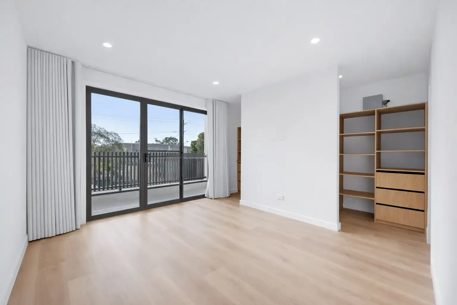 Compact rental bedroom prepared for photography