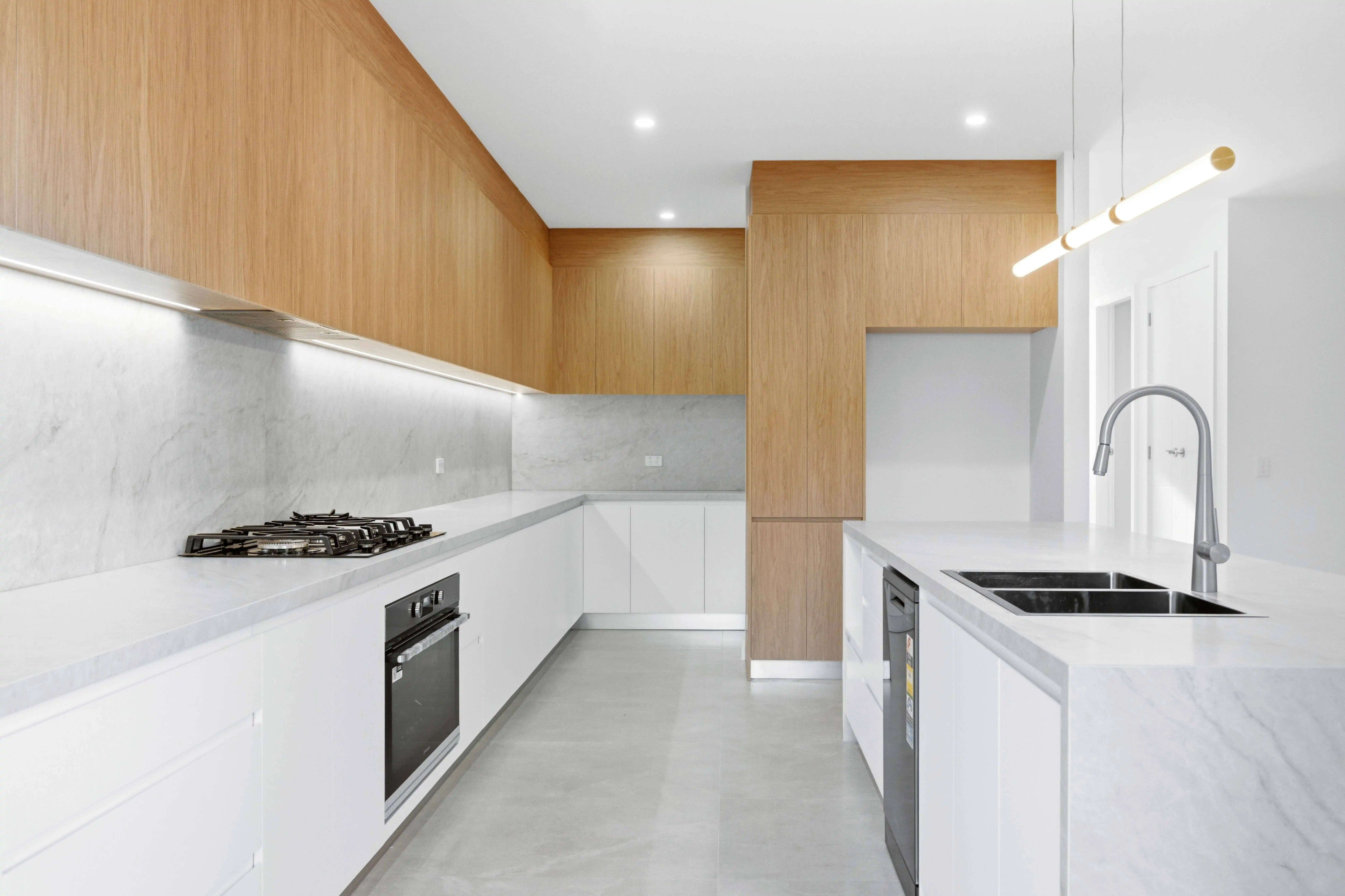 Bright rental kitchen prepared for a property campaign