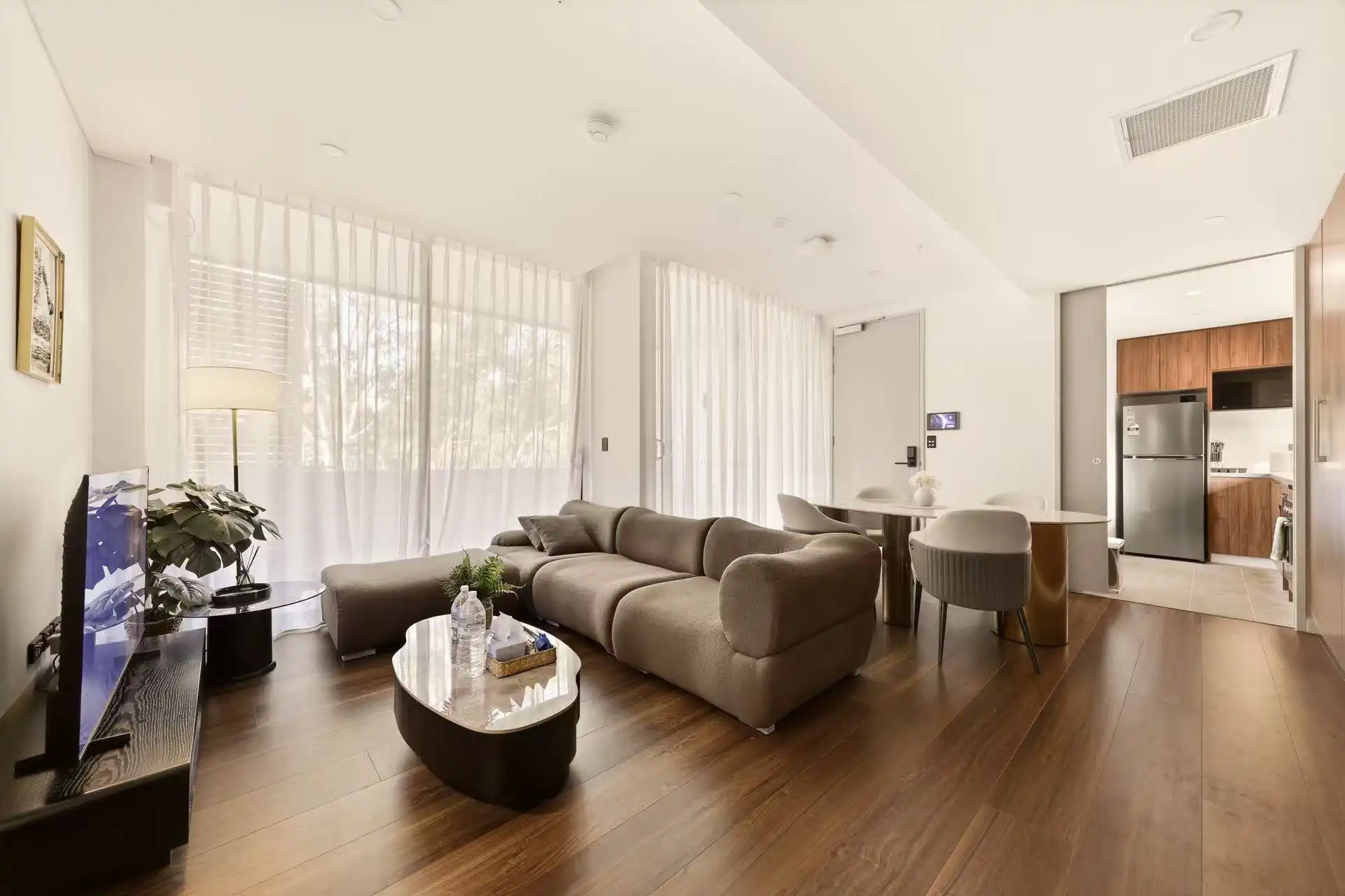 Styled short-stay living room prepared for guest photography